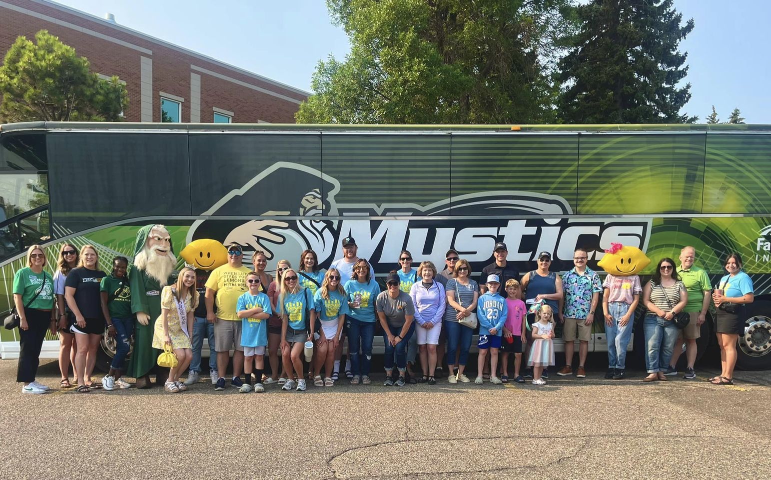 Lemonade Day tour group in front of bus